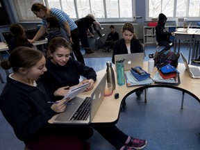 The overcrowding problem at Edinburgh School in Montreal West has forced it to cut its library space in half, hold music classes on a stage in the gym and have the science teacher walk from class to class pushing a cart full of experiments.