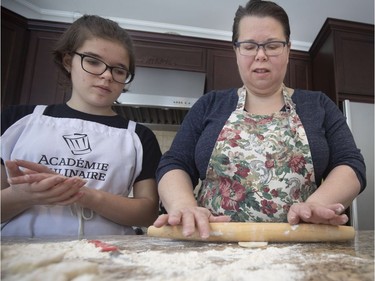 Diane Zalusky and her daughter, Eve Normand, making varenyky. (Allen McInnis / MONTREAL GAZETTE)