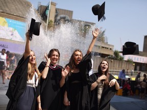 Graduates celebrate in London in a 2013 file photo: "There is clear evidence that profound and high-quality mentorship relationships have lasting and positive impacts on young people personally, academically and socially," Margaux Chetrit-Cassuto writes.
