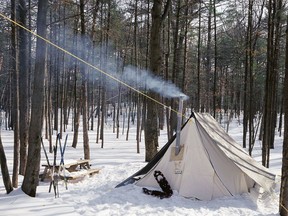 Winter camping in a prospector tent in Oka provincial park.