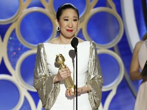 This image released by NBC shows Canadian Sandra Oh accepting the award for best actress in a drama series for her role in "Killing Eve" during the 76th Annual Golden Globe Awards at the Beverly Hilton Hotel on Sunday, Jan. 6, 2019, in Beverly Hills, Calif.