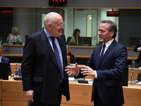 First vice-president of the European Commission in charge of Better Regulation, Inter-Institutional Relations, Frans Timmermans (L) talks with Danish Forein Affairs minister Anders Samuelsen (R) during a General Affairs Council meeting on January 8, 2019 at the EU headquarters in Brussels.
