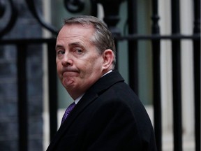 Britain's International Trade Secretary Liam Fox arrives for the weekly cabinet meeting at 10 Downing street in London on January 15, 2019. - Parliament is to finally vote today on whether to support or vote against the agreement struck between Prime Minister Theresa May's government and the European Union.