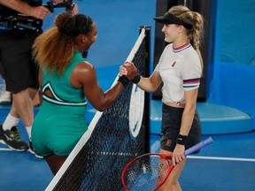 Serena Williams of the US (L) shakes hands after victory over Canada's Eugenie Bouchard during their women's singles match on day four of the Australian Open tennis tournament in Melbourne on January 17, 2019.