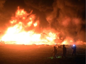 TOPSHOT - Flames burn at the scene of a massive blaze trigerred by a leaky pipeline in Tlahuelilpan, Hidalgo state, on January 18, 2019. - An explosion and fire has killed at least 66 people who were collecting fuel gushing from a leaking pipeline in central Mexico, the Hidalgo state governor said on Saturday.