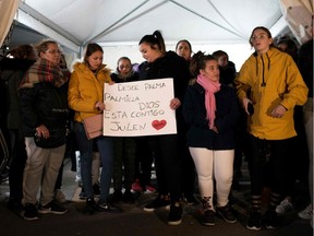 Just before his body was found, neighbours gathered in support of two-year-old Julen Rosello and his parents in Totalan, southern Spain, on January 24, 2019. The boy fell down a narrow shaft on Jan. 13 as he was playing while his parents prepared a picnic in Totalan, Spain.