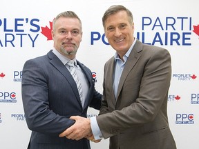 People's Party of Canada leader Maxime Bernier, right, poses with James Seale, a candidate for the upcoming federal byelection in the riding of Outremont during an event in Montreal, Sunday, January 27, 2019. The federal byelection will take place on February 25.