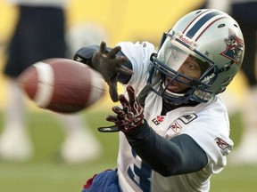 Montreal Alouettes wide receiver Tim Maypray grabs a pass at practice Nov. 26, 2010 in Edmonton. Tim Maypray, who was a receiver with the Montreal Alouettes during their 2010 Grey Cup season, has died. He was 30.