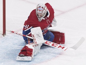 Canadiens goaltender Carey Price makes one of his 33 saves en route to a 3-0 shutout win over the Vancouver Canucks in NHL action at the Bell Centre in Montreal on Jan. 3, 2019.