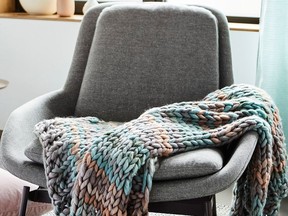 Look for pretty colours like pink and green to weave their way into spring decorating trends, giving a fresh and feminine feel to today's current grey decor. Multicolour Chunky-knit Thrown, $115, Simons.