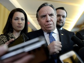 While being peppered by reporters' questions on Tuesday, Quebec Premier François Legault defended his government's actions on religious symbols and transferring RIverdale High School to the French system.