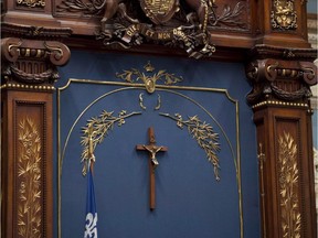 Under proposed legislation, religious symbols would be banned for public servants, but the giant crucifix in the National Assembly gets the CAQ seal of approval, because it has been deemed a cultural symbol.