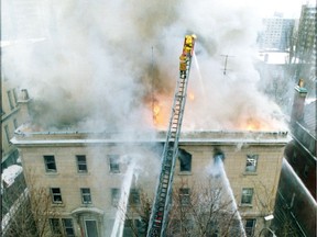 Firefighters at the Soviet consulate in Montreal pour water on blaze from outside on Jan. 14, 1987. Photo by Pierre Obendrauf