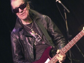 FILE - In this July 21, 2002 file photo, Link Wray, the 73-year-old Shawnee Indian and acclaimed pioneer of punk and heavy metal, performs at the Shim Sham Club in New Orleans. "RUMBLE: The Indians Who Rocked the World," a new PBS Independent Lens documentary set to air Monday, Jan 21, 2019, shows how Native Americans laid the foundations to rock, blues and jazz.