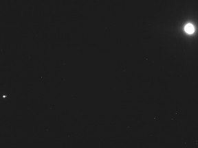 This image captured on Dec. 19, 2018, by a camera on the Osiris-Rex spacecraft shows the asteroid Bennu, top right, about 43 kilometres from the spacecraft, and the Earth and moon, bottom left, more than 110 million kilometres away. Bennu, just 1,600 feet (500 metres) across, is the smallest celestial body ever to be orbited by a spacecraft. NASA/Goddard/University of Arizona/Lockheed Martin Space via AP)