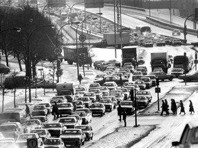 Strike logjam: Morning rush-hour traffic halts at Bonaventure Expressway -- University St. intersection on Jan. 15, 1982. Members of the unions representing office and maintenance workers at the Montreal Urban Community Transit Commission were on strike, throwing the city into chaos.