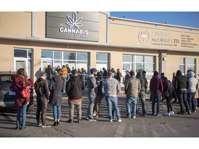 Customers line up at the retail cannabis store in Charlottetown on October 17, 2018. Atlantic Canadians are buying far more legal cannabis per capita than Canadians elsewhere in the country, Statistics Canada figures show. The national statistics agency has released province-by-province sales numbers for the first six weeks of legalization up to Dec. 1. The numbers reveal dramatic differences between provinces. Prince Edward Island tops the list, with residents on average spending $13.83 each on legal pot in six weeks. Nova Scotia came second at $11.34.