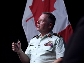 Chief of the Defence Staff Jonathan Vance speaks during a press conference in Ottawa on October 5, 2017. Canada's top military officer is admitting slower-than-expected progress as new figures show only incremental growth in the number of women in uniform over the past three years. Yet despite the slow start, Gen. Jonathan Vance says he remains committed to his goal of making the Canadian Forces more diverse -- which includes having women represent one-quarter of all military personnel by 2026.