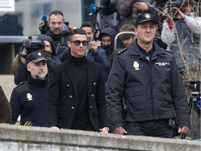 Cristiano Ronaldo and his girlfriend Georgina Rodriguez arrive at the Provincial Court of Madrid in Madrid, Spain, where he accepted an €18.8 million (£16.5 million) fine and a suspended prison sentence over tax fraud charges.  Featuring: Cristiano Ronaldo, Georgina Rodriguez Where: Madrid, Madrid, Spanien When: 22 Jan 2019 Credit: DyD Fotografos/Future Image/WENN.com  **Not available for publication in Germany, Spain** ORG XMIT: wenn35902470