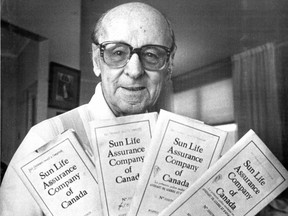 Wilfrid Jolicoeur holds four policies he says he will cancel to protest Sun Life's move to Toronto. A similar photo was published on Jan. 12 1978 in the Gazette.