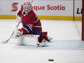 Montreal Canadiens goaltender Carey Price watches a rebound as he makes a save against the Toronto Maple Leafs in Montreal on Feb. 9, 2019.