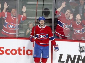 Canadiens fans celebrate with Phillip Danault after his second-period goal against the Florida Panthers during an NHL game at the Bell Centre in Montreal on January 15, 2019.