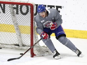 Jesperi Kotkaniemi cuts close to the goalpost as he circles the net during Montreal Canadiens practice at the Bell Sports Complex in Brossard on Jan. 31, 2019.