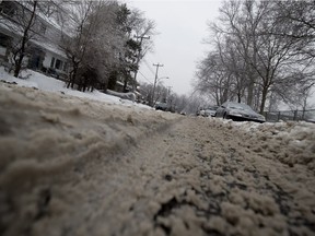 A war of words has escalated between Mayor Valérie Plante and the municipal opposition over the city’s icy sidewalks and rutted streets. Above: Hampton St. in N.D.G.