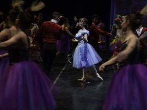 Michaela Gobas (centre) dancing the role of Ella in Ballet Ouest de Montreal's reworking of the Cinderella ballet during rehearsal in Ste-Geneviève on Sunday.