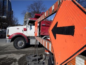 A dump truck sits on the crosswalk at a red light at Tupper St. and Atwater Ave., where a pedestrian was killed Dec. 12.