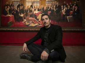 Kent Monkman with his painting The Daddies, part of his exhibition Shame and Prejudice, on display at the McCord Museum. "Laughter and humour is a good way to seduce people into the work,” he says. “Then you can address other, more serious issues."