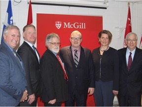 Parliamentary Secretary Jean-Claude Poissant (left to right), McGill vice-principal Louis Arsenault, CEO BiofuelNet Canada Don Smith, Agriculture Minister Lawrence MacAulay, Dean Anja Geitmann and Lac St Louis MP Francis Scarpaleggia, pose after a press conference at McGill’s Macdonald Campus in Ste-Anne-de-Bellevue to announce a federal investment of $7 million to fund biomass research.