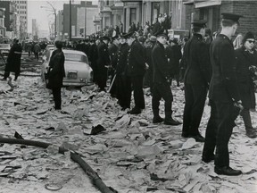 Mackay St. is littered with paper and computer cards after a student occupation of the computer centre of Sir George Williams University (now part of Concordia) came to an end on Feb. 11, 1969.