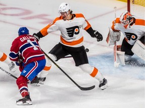 Montreal Canadiens right-wing Brendan Gallagher scores his third goal of the game against Philadelphia Flyers goaltender Brian Elliott at the Bell Centre on Feb. 21, 2019.