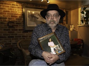 Michael Manning is seen with a photo of his daughter Tara at her first communion, at his home in Beaconsfield on Feb. 22, 2019.