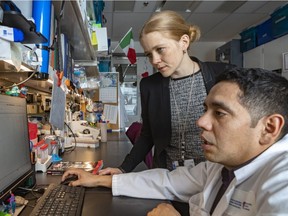 Pediatric neurologist Genevieve Bernard chats with research assistant Kether Guerrero at the MUHC in Montreal on Monday, Feb. 25, 2019. Bernard joined forces with scientists from the Rady Children's Institute for Genomic Medicine in San Diego to discover a new genetic mutation responsible for a rare paediatric neurodevelopmental condition known as VARS-related disorder.