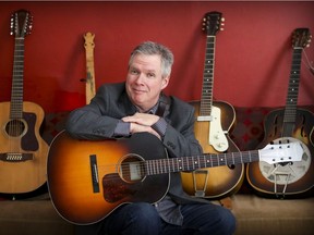 Michael Jerome Browne at his home in Montreal with his tools of the trade. His new album is That's Where It's At!