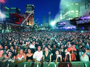 Fans fill Place des Festivals to watch Jessie Reyez perform at a free outdoor show at the Montreal International Jazz Festival in Montreal Tuesday July 3, 2018.