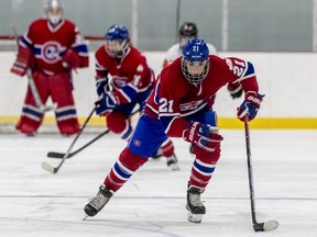 Les Canadiennes' Hilary Knight takes the puck up the middle of the ice during a 3-1 loss to the Calgary Inferno at Place Bell in Laval on Oct. 14, 2018.