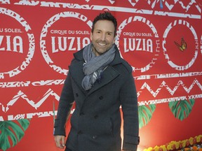 Eric Salvail is photographed on the red carpet before the premiere of Cirque du Soleil's Luzia show on May 4, 2016.