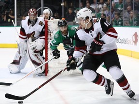 Jordan Weal of the Arizona Coyotes skates with the puck during NHL game against the Dallas Stars at American Airlines Center on Feb. 4, 2019 in Dallas.