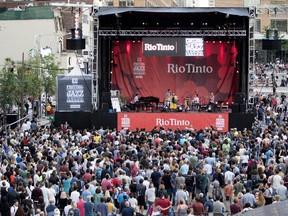 A crowd fills in Sainte-Catherine Street to listen to Banda Magda during the opening day of the Montreal International Jazz Festival in Montreal on Thursday June 28, 2018.