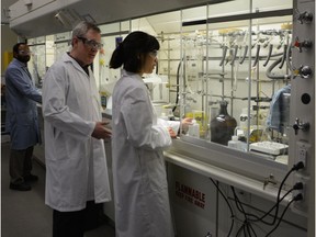 Todd L. Lowary, centre, in the GlycoNet laboratory.