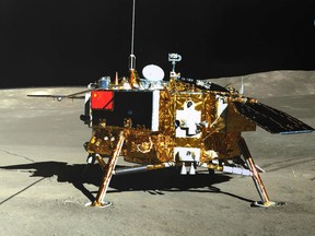 (FILES) This file picture released on January 11, 2019 by the China National Space Administration (CNSA) via CNS shows the Chang'e-4 lunar probe, taken by the Yutu-2 moon rover, on the far side of the moon. - China's lunar lander has woken from a freezing fortnight-long hibernation to find night-time temperatures on the moon's dark side are colder than previously thought, the Chinese space agency said on January 31, 2019.