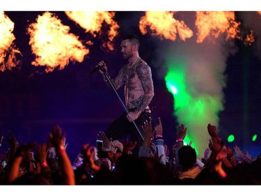 Lead vocalist of Maroon 5 Adam Levine performs during the halftime show of Super Bowl LIII between the New England Patriots and the Los Angeles Rams at Mercedes-Benz Stadium on Sunday, Feb. 3, 2019, in Atlanta.