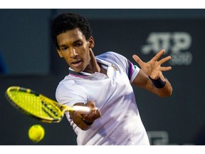 Montrealer Félix Auger-Aliassime returns the ball to Uruguay's Pablo Cuevas during their ATP World Tour Rio Open singles semi-final match at the Jockey Club in Rio de Janeiro, Brazil, on Saturday, Feb. 23, 2019.