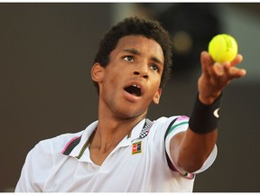 Montreal's Félix Auger-Aliassime serves against Serbia's Laslo Djere during the ATP World Tour Rio Open singles final match at the Jockey Club in Rio de Janeiro, Brazil, on Sunday, Feb .24, 2019.