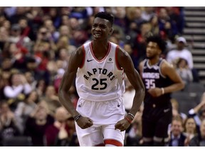 Toronto Raptors forward Chris Boucher celebrates after dunking the ball during second half NBA basketball action against the Sacramento Kings in Toronto on Jan. 22, 2019.