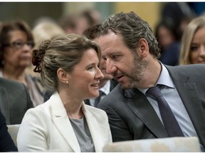 Two powerful members of the PMO, Gerald Butts, senior political adviser to Prime Minister Justin Trudeau, and Katie Telford, chief of staff to the PM, chat before a swearing-in of new cabinet ministers at Rideau Hall in Ottawa on July 18, 2018.