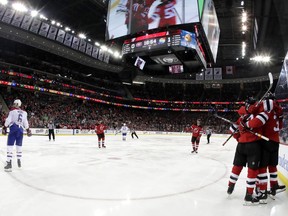 New Jersey Devils players celebrate a goal by Kurtis Gabriel during the second period of NHL game against the Montreal Canadiens on Monday, Feb. 25, 2019, at the Prudential Centre in Newark, N.J. The Devils won the game 2-1.